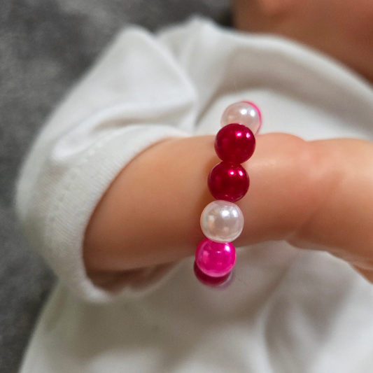 Armband mit Kunstperlen